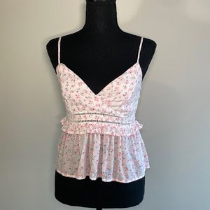 Tank top from Mi Ami in size medium. Top has floral print and cut outs.